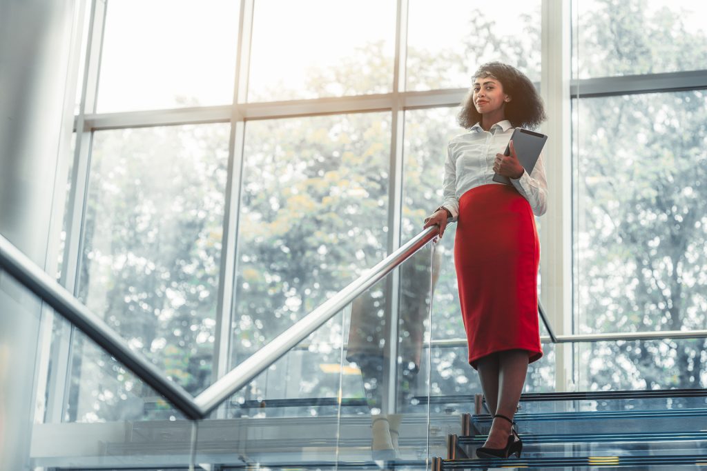 Dazzling African-american Businesswoman With A Tablet Pc Is Stan